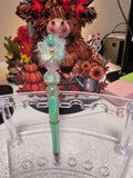 Teal butterfly pen