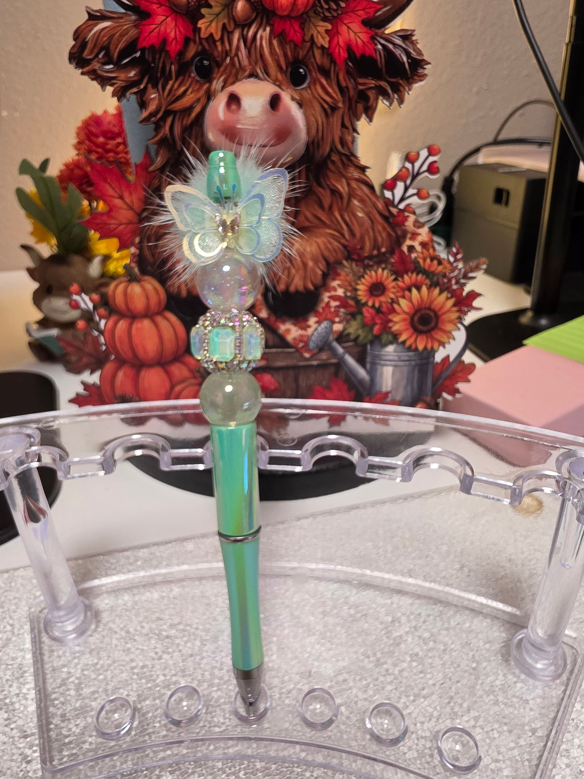Teal butterfly pen